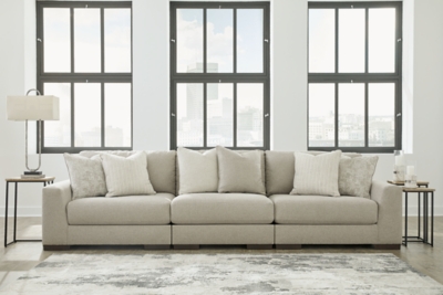 Distinguished yet unassuming, the versatile and visually appealing Lyndeboro sofa adds a refined touch to any space. Inspired by the dapper look of fine tailored menswear, its rich texture turns heads, while a soft, light gray hue blends effortlessly with other colors in the room. Clean lines and wide track arms embrace a minimalist contemporary style. The sofa's modular design offers a variety of configurations for flexibility. Plush, reversible deep cushions provide extraordinary comfort and can be rotated for longer life. Accent pillows in soft shades of complementary colors add subtle contrast. This handsome piece will make a memorable impression again and again.Includes 3 pieces: armless chair, left-arm facing corner chair and right-arm facing corner chair | "Left-arm" and "right-arm" describe the position of the arm when you face the piece | Corner-blocked frame | High-resiliency foam cushions wrapped in thick poly fiber | Reversible cushions | Polyester upholstery | Toss pillows included | Pillows with feather blend inserts | Exposed feet with faux wood finish | Platform foundation system resists sagging 3x better than spring system after 20,000 testing cycles by providing more even support | Smooth platform foundation maintains tight, wrinkle-free look without dips or sags that can occur over time with sinuous spring foundations | Estimated Assembly Time: 10 Minutes