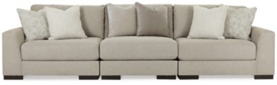 Distinguished yet unassuming, the versatile and visually appealing Lyndeboro sofa adds a refined touch to any space. Inspired by the dapper look of fine tailored menswear, its rich texture turns heads, while a soft, light gray hue blends effortlessly with other colors in the room. Clean lines and wide track arms embrace a minimalist contemporary style. The sofa's modular design offers a variety of configurations for flexibility. Plush, reversible deep cushions provide extraordinary comfort and can be rotated for longer life. Accent pillows in soft shades of complementary colors add subtle contrast. This handsome piece will make a memorable impression again and again.Includes 3 pieces: armless chair, left-arm facing corner chair and right-arm facing corner chair | "Left-arm" and "right-arm" describe the position of the arm when you face the piece | Corner-blocked frame | High-resiliency foam cushions wrapped in thick poly fiber | Reversible cushions | Polyester upholstery | Toss pillows included | Pillows with feather blend inserts | Exposed feet with faux wood finish | Platform foundation system resists sagging 3x better than spring system after 20,000 testing cycles by providing more even support | Smooth platform foundation maintains tight, wrinkle-free look without dips or sags that can occur over time with sinuous spring foundations | Estimated Assembly Time: 10 Minutes