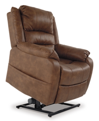 Double your pleasure and your sense of style with the Yandel power lift recliner. Dual motor capability gives you the freedom to recline back and elevate your legs independently for more custom comfort positioning. And with the touch of a button, power lift feature gently eases you from the ultimate slumber into a lift-and-tilt position to get you back on your feet, effortlessly.  Designer upholstery may look like gently battered leather, but it’s actually a feel-good fabric with warm, cozy appeal.One-touch (hand control) power button with adjustable positions | Corner-blocked frame with metal reinforced seat | Attached cushions | High-resiliency foam cushions wrapped in thick poly fiber | Side pocket storage | Dual motors control the footrest and back independently for custom comfort positioning | Emergency battery backup runs on two 9-volt batteries (not included), in case of power outage | Power cord included; UL Listed | Polyester upholstery | Excluded from promotional discounts and coupons | Estimated Assembly Time: 15 Minutes