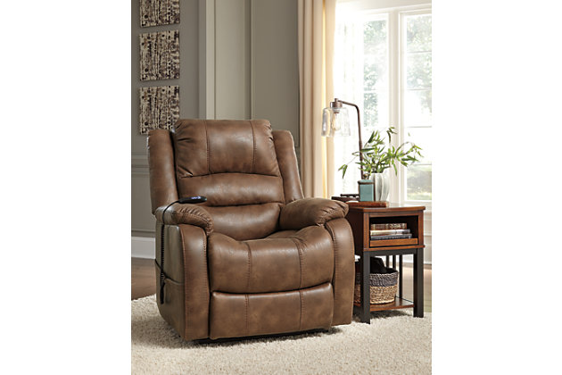 Double your pleasure and your sense of style with the Yandel power lift recliner. Dual motor capability gives you the freedom to recline back and elevate your legs independently for more custom comfort positioning. And with the touch of a button, power lift feature gently eases you from the ultimate slumber into a lift-and-tilt position to get you back on your feet, effortlessly.  Designer upholstery may look like gently battered leather, but it’s actually a feel-good fabric with warm, cozy appeal.One-touch (hand control) power button with adjustable positions | Corner-blocked frame with metal reinforced seat | Attached cushions | High-resiliency foam cushions wrapped in thick poly fiber | Side pocket storage | Dual motors control the footrest and back independently for custom comfort positioning | Emergency battery backup runs on two 9-volt batteries (not included), in case of power outage | Power cord included; UL Listed | Polyester upholstery | Excluded from promotional discounts and coupons | Estimated Assembly Time: 15 Minutes