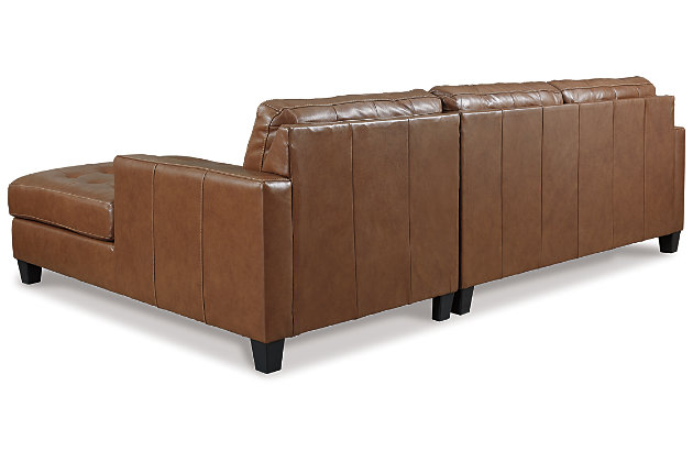 Bask in the beauty of the Baskove sectional. Reserved exclusively for those with an eye for fine contemporary design, this generously scaled sectional in auburn brown is dressed to impress in every way. Real leather throughout the seating area provides incomparable comfort where it counts. Sleek track armrests, tufted box cushions and a sumptuous chaise are the embodiment of luxury.Includes 2 pieces: right-arm facing corner chaise and left-arm facing loveseat | "Left-arm" and "right-arm" describe the position of the arm when you face the piece | Corner-blocked frame | Attached back and loose seat cushions | High-resiliency foam cushions wrapped in thick poly fiber | Leather interior upholstery; vinyl/polyester upholstery | Exposed feet with faux wood finish | Platform foundation system resists sagging 3x better than spring system after 20,000 testing cycles by providing more even support | Smooth platform foundation maintains tight, wrinkle-free look without dips or sags that can occur over time with sinuous spring foundations | Estimated Assembly Time: 5 Minutes