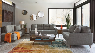 Feed your mid-century modern nostalgia with a contemporary twist in the Zardoni loveseat. Colored in an attractive gray, it’s upholstered in a timeless texture. Classic tufted back and tapered peg legs are a nice revival. Linear profile with two toss pillows adds plenty of fresh style, perfect for small spaces.Corner-blocked frame | Attached back and loose seat cushions | High-resiliency foam cushions wrapped in thick poly fiber | 2 decorative pillows included | Pillows with soft polyfill | Polyester upholstery and pillows | Exposed feet with faux wood finish | Excluded from promotional discounts and coupons