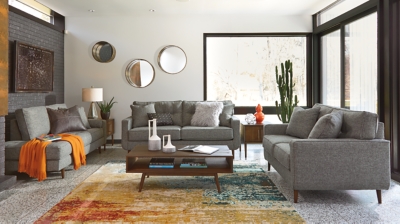 Feed your mid-century modern nostalgia with a contemporary twist in the Zardoni loveseat. Colored in an attractive gray, it’s upholstered in a timeless texture. Classic tufted back and tapered peg legs are a nice revival. Linear profile with two toss pillows adds plenty of fresh style, perfect for small spaces.Corner-blocked frame | Attached back and loose seat cushions | High-resiliency foam cushions wrapped in thick poly fiber | 2 decorative pillows included | Pillows with soft polyfill | Polyester upholstery and pillows | Exposed feet with faux wood finish | Excluded from promotional discounts and coupons