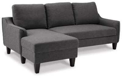 Small space living is easier than ever with the Jarreau sofa chaise sleeper. The soft cushions and oversized pillow backs are sure to be a comfortable seating treat. Sporting sleek arms and friendly apartment sizing, this sleeper makes a fashionable first impression, and is quick to convert into a sleeper with the included pullout cushion. Great to accommodate guests for an overnight stay.Loose cushions | High-resiliency foam cushions wrapped in thick poly fiber | Polyester upholstery | Includes a pullout cushion that sits atop a supportive steel frame | Exposed feet with faux wood finish | Estimated Assembly Time: 15 Minutes