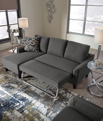 Small space living is easier than ever with the Jarreau sofa chaise sleeper. The soft cushions and oversized pillow backs are sure to be a comfortable seating treat. Sporting sleek arms and friendly apartment sizing, this sleeper makes a fashionable first impression, and is quick to convert into a sleeper with the included pullout cushion. Great to accommodate guests for an overnight stay.Loose cushions | High-resiliency foam cushions wrapped in thick poly fiber | Polyester upholstery | Includes a pullout cushion that sits atop a supportive steel frame | Exposed feet with faux wood finish | Estimated Assembly Time: 15 Minutes