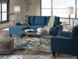 Small space living is looking better than ever with the Jarreau living room set. This high-style ensemble with sofa chaise sleeper and chair entices with soft cushions and oversized pillow backs for a chic seating arrangement. Sporting sleek arms and friendly apartment sizing, the sofa chaise makes a fashionable first impression, and is quick to convert into a sleeper with the included pullout cushion.Includes sofa chaise and chair | Loose cushions | High-resiliency foam cushions wrapped in thick poly fiber | Polyester upholstery | Sofa chaise with pullout cushion that sits atop a supportive steel frame | Exposed feet with faux wood finish | Estimated Assembly Time: 45 Minutes