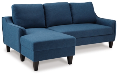 Small space living is easier than ever with the blue Jarreau sofa chaise sleeper. The soft cushions and oversized pillow backs are sure to be a comfortable seating treat. Sporting sleek arms and friendly apartment sizing, this sleeper makes a fashionable first impression, and is quick to convert into a sleeper with the included pullout cushion. Great to accommodate guests for an overnight stay.Loose cushions | High-resiliency foam cushions wrapped in thick poly fiber | Polyester upholstery | Includes a pullout cushion that sits atop a supportive steel frame | Exposed feet with faux wood finish | Estimated Assembly Time: 30 Minutes