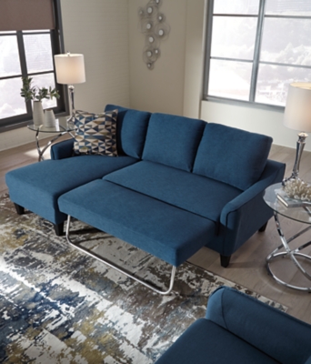 Small space living is easier than ever with the blue Jarreau sofa chaise sleeper. The soft cushions and oversized pillow backs are sure to be a comfortable seating treat. Sporting sleek arms and friendly apartment sizing, this sleeper makes a fashionable first impression, and is quick to convert into a sleeper with the included pullout cushion. Great to accommodate guests for an overnight stay.Loose cushions | High-resiliency foam cushions wrapped in thick poly fiber | Polyester upholstery | Includes a pullout cushion that sits atop a supportive steel frame | Exposed feet with faux wood finish | Estimated Assembly Time: 30 Minutes