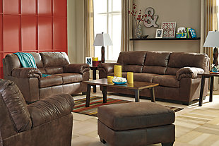 If you love the cool look of leather but long for the warm feel of fabric, you’ll find the Bladen sofa fits the bill beautifully. Rest assured, the textural, multi-tonal upholstery is rich with character and interest—while plush, pillowy cushions merge comfort and support with a high-style design.Corner-blocked frame | Attached back and loose seat cushions | High-resiliency foam cushions wrapped in thick poly fiber | Polyester/polyurethane upholstery | Exposed tapered feet | Excluded from promotional discounts and coupons