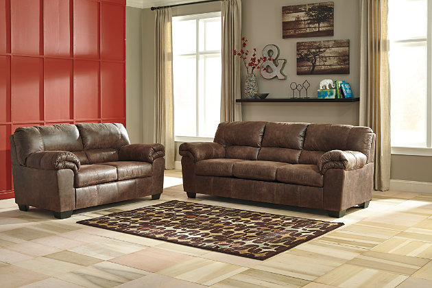 If you love the cool look of leather but long for the warm feel of fabric, you’ll find the Bladen sofa fits the bill beautifully. Rest assured, the textural, multi-tonal upholstery is rich with character and interest—while plush, pillowy cushions merge comfort and support with a high-style design.Corner-blocked frame | Attached back and loose seat cushions | High-resiliency foam cushions wrapped in thick poly fiber | Polyester/polyurethane upholstery | Exposed tapered feet | Excluded from promotional discounts and coupons
