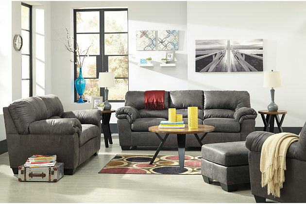 If you love the cool look of leather but long for the warm feel of fabric, you’ll find the Bladen sofa fits the bill beautifully. Rest assured, the textural, multi-tonal upholstery is rich with character and interest—while plush, pillowy cushions merge comfort and support with a high-style design.Corner-blocked frame | Attached back and loose seat cushions | High-resiliency foam cushions wrapped in thick poly fiber | Exposed feet with faux wood finish | Excluded from promotional discounts and coupons