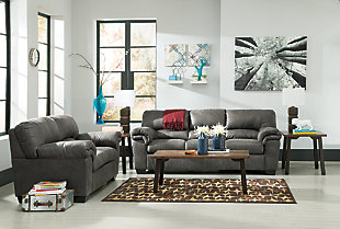 If you love the cool look of leather but long for the warm feel of fabric, you’ll find the Bladen sofa fits the bill beautifully. Rest assured, the textural, multi-tonal upholstery is rich with character and interest—while plush, pillowy cushions merge comfort and support with a high-style design.Corner-blocked frame | Attached back and loose seat cushions | High-resiliency foam cushions wrapped in thick poly fiber | Exposed feet with faux wood finish | Excluded from promotional discounts and coupons