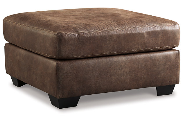 If you love the cool look of leather but long for the warm feel of fabric, you'll find the Bladen oversized ottoman fits the bill beautiy. Enhancing its handsome profile and generous scale: a textural, multi-tonal upholstery that’s loaded with character and interest. A rich addition to your space at a comfortable price.Corner-blocked frame | Firmly cushioned | High-resiliency foam cushion wrapped in thick poly fiber | Polyester/polyurethane upholstery | Exposed tapered feet