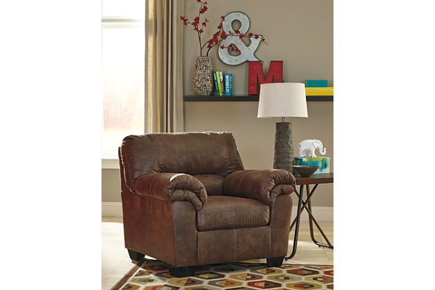 If you love the cool look of leather but long for the warm feel of fabric, you’ll find the Bladen chair fits the bill beautifully. Rest assured, the textural, multi-tonal upholstery is rich with character and interest—while plush, pillowy cushions merge comfort and support with a high-style design.Corner-blocked frame | Attached back and loose seat cushions | High-resiliency foam cushions wrapped in thick poly fiber | Polyester/polyurethane upholstery | Exposed tapered feet