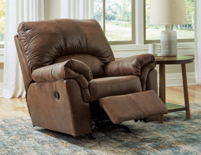 If you love the cool look of leather but long for the warm feel of fabric, you’ll find the Bladen rocker recliner fits the bill beautifully. Rest assured, the textural, multi-tonal upholstery is rich with character and interest—while plush, pillowy cushions merge comfort and support with a high-style design.Gentle rocking motion | Tab pull reclining motion | Corner-blocked frame with metal reinforced seat | Attached back and seat cushions | High-resiliency foam cushions wrapped in thick poly fiber | Polyester/polyurethane upholstery