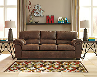 If you love the cool look of leather but long for the warm feel of fabric, you’ll find the Bladen sofa fits the bill beautiy. Rest assured, the textural, multi-tonal upholstery is rich with character and interest—while plush, pillowy cushions merge comfort and support with a high-style design.Corner-blocked frame | Attached back and loose seat cushions | High-resiliency foam cushions wrapped in thick poly fiber | Polyester/polyurethane upholstery | Exposed tapered feet