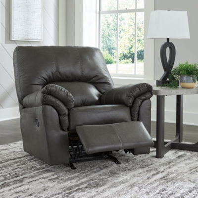 If you love the cool look of leather but long for the warm feel of fabric, you’ll find the Bladen rocker recliner fits the bill beautifully. Rest assured, the textural, multi-tonal upholstery is rich with character and interest—while plush, pillowy cushions merge comfort and support with a high-style design.Gentle rocking motion | Tab pull reclining motion | Corner-blocked frame with metal reinforced seat | Attached back and seat cushions | High-resiliency foam cushions wrapped in thick poly fiber | Polyester/polyurethane upholstery