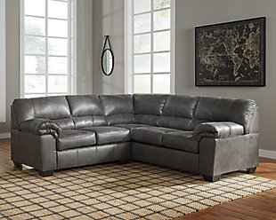 If you love the cool look of leather but long for the warm feel of fabric, you’ll find the Bladen sectional fits the bill beautifully. Rest assured, the textural, multi-tonal upholstery is rich with character and interest—while plush, pillowy cushions merge comfort and support with a high-style design.Includes 2 pieces: left-arm facing loveseat and right-arm facing sofa | Left-arm and "right-arm" describe the position of the arm when you face the piece | Corner-blocked frame | Attached back and loose seat cushions | High-resiliency foam cushions wrapped in thick poly fiber | Polyester/polyurethane upholstery | Exposed triblock feet | Estimated Assembly Time: 5 Minutes