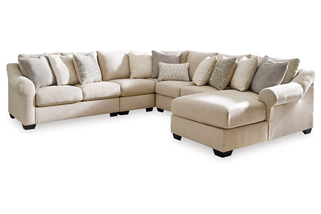 Whether your personal style is urban glam or cozy modern farmhouse, rest assured the Carnaby sectional is an inspired choice. Irresistible elements include sloped and sculptural roll arms and a light and lovely upholstery with linen weave texture that’s beautifully on trend. A plethora of decorative designer pillows add a sense of luxury.Includes 5 pieces: right-arm facing corner chaise, armless loveseat, armless chair, left-arm facing loveseat and wedge  | "Left-arm" and "right-arm" describe the position of the arm when you face the piece | Corner-blocked frame | Loose cushions  | High-resiliency reversible foam cushions wrapped in thick poly fiber | Polyester upholstery  | Throw pillows included | Pillows with soft polyfill | Exposed feet with faux wood finish | Platform foundation system resists sagging 3x better than spring system after 20,000 testing cycles by providing more even support | Smooth platform foundation maintains tight, wrinkle-free look without dips or sags that can occur over time with sinuous spring foundations | Estimated Assembly Time: 20 Minutes