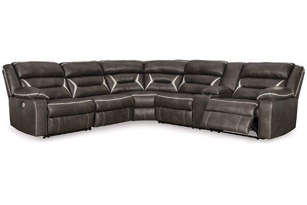You could play it safe. Or you could choose to stand out in the crowd with the brilliantly styled Kincord sectional with power. Ultra cool, ultra contemporary and ultra comfortable, this fashion-forward sectional sports a fabulous faux leather enhanced with contrasting stitching that’s right on point. Rest assured, sumptuous pillow top armrests and sleek channel cushioning feel every bit as good as they look. Enlightened elements include a power control with USB plug-in and blue LED lighting (by the cup holders) to create a home theater experience worthy of A-listers.Includes 4 pieces: armless chair, left-arm facing zero wall power recliner, right-arm facing power reclining sofa with console and wedge | "Left-arm" and "right-arm" describe the position of the arm when you face the piece | One-touch power control with adjustable positions | Zero wall design requires minimal space between wall and chair back | Corner-blocked frame with metal reinforced seat | Attached cushions | High-resiliency foam cushions wrapped in thick poly fiber | Includes USB charging port in the power control  | Lift-top storage console includes 2 cup holders with blue LED lighting | Polyester/polyurethane upholstery | Power cord included; UL Listed | Estimated Assembly Time: 45 Minutes