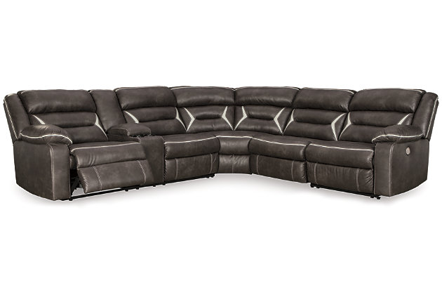 You could play it safe. Or you could choose to stand out in the crowd with the brilliantly styled Kincord sectional with power. Ultra cool, ultra contemporary and ultra comfortable, this fashion-forward sectional sports a fabulous faux leather enhanced with contrasting stitching that’s right on point. Rest assured, sumptuous pillow top armrests and sleek channel cushioning feel every bit as good as they look. Enlightened elements include a power control with USB plug-in and blue LED lighting (by the cup holders) to create a home theater experience worthy of A-listers.Includes 4 pieces: armless chair, right-arm facing zero wall power recliner, left-arm facing power reclining sofa with console and wedge | "Left-arm" and "right-arm" describe the position of the arm when you face the piece | One-touch power control with adjustable positions | Corner-blocked frame with metal reinforced seat | Attached cushions | High-resiliency foam cushions wrapped in thick poly fiber | Includes USB charging port in the power control  | Lift-top storage console includes 2 cup holders with blue LED lighting  | Polyester/polyurethane upholstery | Power cord included; UL Listed | Estimated Assembly Time: 45 Minutes