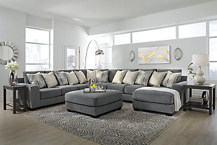 Life may be full of sacrifices, but with the Castano sectional in jewel gray, you compromise nothing to get everything you could ask for. Crisp, clean, contemporary style, pillowy softness and exceptional craftsmanship are yours for the taking at a price that’s surprisingly affordable for such a generously scaled, quality offering. Designed for looks and longevity, this sectional includes our exclusive platform foundation system made to resist sagging and maintain a tight, wrinkle-free aesthetic.Includes 5 pieces: right-arm facing corner chaise, armless loveseat, armless chair, left-arm facing sofa and wedge | Corner-blocked frame | Loose back and seat cushions | 12 toss pillows included | Pillows with soft polyfill | Polyester/linen upholstery | Polyester; polyester/linen; polyester/cotton/rayon; polyester/cotton pillows | Platform foundation system resists sagging 3x better than spring system after 20,000 testing cycles by providing more even support | Smooth platform foundation maintains tight, wrinkle-free look without dips or sags that can occur over time with sinuous spring foundations | Exposed feet with faux wood finish | Estimated Assembly Time: 20 Minutes