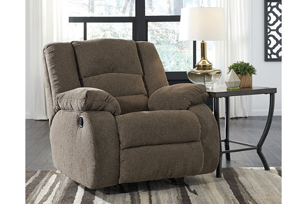 With rounded sides, you’re in for a rocking good time on the Nason rocker recliner. Recline back in infinite positions for comfort. Pillow top arms and feel-good fabric will make you never want to leave. Waterfall back design adds plenty of style to this recliner’s function.Gentle rocking motion | Pull tab reclining motion | Corner-blocked frame with metal reinforced seat | High-resiliency foam cushion wrapped in thick poly fiber | Polyester upholstery | Excluded from promotional discounts and coupons