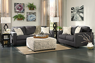 The sleek mid-century lines of the Alenya sofa are always in vogue. With neatly tailored box cushions and track arms, the microfiber upholstered sofa is supremely comfortable and stylish. Tonal piping and a pair of printed pillows further refine the silhouette.Corner-blocked frame | Attached back and loose seat cushions | High-resiliency foam cushions wrapped in thick poly fiber | 2 decorative pillows included | Pillows with soft polyfill | Upholstery is polyester/nylon | Pillows are linen/viscose | Excluded from promotional discounts and coupons