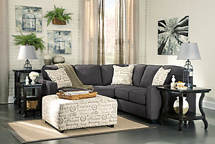 The sleek mid-century lines of the Alenya sectional are always in vogue. With neatly tailored box cushions and track arms, this microfiber upholstered ensemble is supremely comfortable and stylish. Tonal piping and a trio of accent pillows are touches of refinement.Includes 2 pieces: right-arm facing loveseat and left-arm facing sofa | "Left-arm" and "right-arm" describes the position of the arm when you face the piece | Corner-blocked frame | Attached back and loose seat cushions | High-resiliency foam cushions wrapped in thick poly fiber | 3 decorative pillows included | Pillows with soft polyfill | Polyester/nylon upholstery; linen/viscose and polyester/nylon pillows | Exposed legs with faux wood finish | Estimated Assembly Time: 5 Minutes