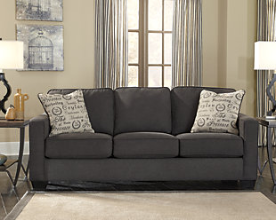 The sleek mid-century lines of the Alenya sofa are always in vogue. With neatly tailored box cushions and track arms, the microfiber upholstered sofa is supremely comfortable and stylish. Tonal piping and a pair of printed pillows further refine the silhouette.Corner-blocked frame | Attached back and loose seat cushions | High-resiliency foam cushions wrapped in thick poly fiber | 2 decorative pillows included | Pillows with soft polyfill | Upholstery is polyester/nylon | Pillows are linen/viscose | Excluded from promotional discounts and coupons