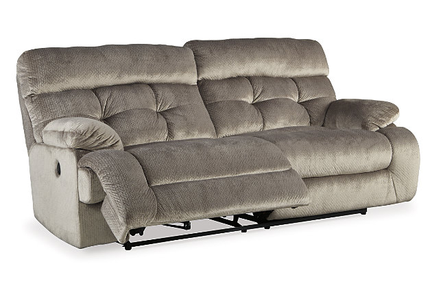 A large scale means large comfort with the Brassville power reclining living room set. And with this 3-piece set—which includes a two-seat sofa, double loveseat and wide seat recliner—there is plenty of room for everyone to recline with ease at the touch of a button. Bustle back tufting adds the right amount of casually cool style.Includes 3 pieces: power reclining sofa, power reclining loveseat with console and wide seat recliner | Dual-sided recliners (sofa and loveseat) | One-touch power control with adjustable positions | Corner-blocked frame with metal reinforced seats | Attached back and seat cushions | High-resiliency foam cushions wrapped in thick poly fiber | Polyester upholstery | Power cord included; UL Listed