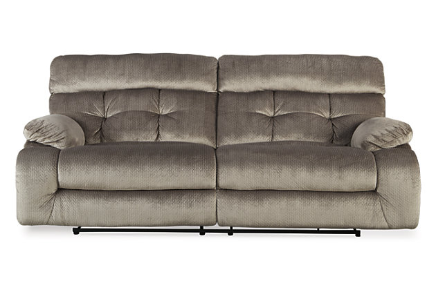 A large scale means large comfort with the Brassville power reclining sofa. Two wonderfully wide seats are upholstered in a textural, cottony soft fabric. Recline as far back as you please on pillowy arms and headrests at one easy touch of a button. Bustle back tufting adds the right amount of casually cool style.Dual-sided recliner | One-touch power control with adjustable positions | Corner-blocked frame with metal reinforced seats | Attached back and seat cushions | High-resiliency foam cushions wrapped in thick poly fiber | Polyester upholstery | Power cord included; UL Listed