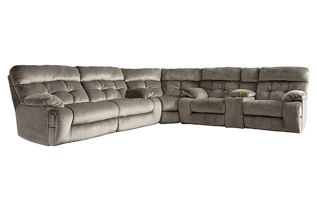 A scale means comfort with the Brassville sectional. Wondery wide seats are upholstered in a textural, cottony soft fabric. Recline as far back as you please on pillowy arms and headrests. Bustle back tufting adds the right amount of casually cool style. With a storage console and two convenient cup holders, you’ll want to stay here forever.Includes 3 pieces: 2-seat reclining sofa, wedge and double reclining loveseat with console | Reclining sofa and reclining loveseat with pull-tab reclining motion with adjustable positions | Console with storage and 2 cup holders | Corner-blocked frame with metal seat | Attached back and seat cushions | High-resiliency foam cushions wrapped in thick poly fiber | Polyester upholstery | Estimated Assembly Time: 10 Minutes