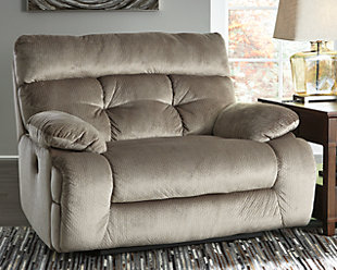 A scale means comfort with the Brassville recliner. Wondery wide seat is upholstered in a textural, cottony soft fabric. Recline as far back as you please on pillowy arms and headrest. Bustle back tufting adds the right amount of casually cool style.Pull tab reclining motion | Corner-blocked frame with metal reinforced seat | Attached back and seat cushions | High-resiliency foam cushion wrapped in thick poly fiber | Polyester upholstery | Excluded from promotional discounts and coupons