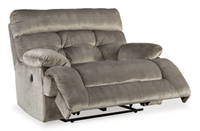 A large scale means large comfort with the Brassville recliner. Wonderfully wide seat is upholstered in a textural, cottony soft fabric. Recline as far back as you please on pillowy arms and headrest. Bustle back tufting adds the right amount of casually cool style.Pull tab reclining motion | Corner-blocked frame with metal reinforced seat | Attached back and seat cushions | High-resiliency foam cushion wrapped in thick poly fiber | Polyester upholstery | Excluded from promotional discounts and coupons