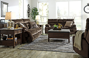 A large scale means large comfort with the Brassville power reclining living room set. And with this 3-piece set—which includes a two-seat sofa, double loveseat and wide seat recliner—there is plenty of room for everyone to recline with ease at the touch of a button. Bustle back tufting adds the right amount of casually cool style.Includes 3 pieces: power reclining sofa, power reclining loveseat with console and wide seat recliner | Dual-sided recliners (sofa and loveseat) | One-touch power control with adjustable positions | Corner-blocked frame with metal reinforced seats | Attached back and seat cushions | High-resiliency foam cushions wrapped in thick poly fiber | Polyester upholstery | Power cord included; UL Listed