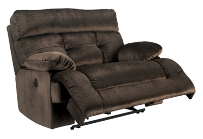 A large scale means large comfort with the Brassville recliner. Wonderfully wide seat is upholstered in a textural, cottony soft fabric. Recline as far back as you please on pillowy arms and headrest. Bustle back tufting adds the right amount of casually cool style.Pull tab reclining motion | Corner-blocked frame with metal reinforced seat | Attached back and seat cushions | High-resiliency foam cushion wrapped in thick poly fiber | Polyester upholstery | Excluded from promotional discounts and coupons