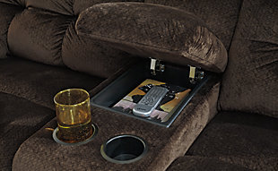 A large scale means large comfort with the Brassville reclining loveseat. Seats are upholstered in a textural, cottony soft fabric. Recline as far back as you please on pillowy arms and headrests. Bustle back tufting adds the right amount of casually cool style. With a storage console and two convenient cup holders, you’ll want to stay here forever.Dual-sided recliner | Pull tab reclining motion | Lift-top storage console and 2 cup holders | Corner-blocked frame with metal reinforced seats | Attached back and seat cushions | High-resiliency foam cushions wrapped in thick poly fiber | Polyester upholstery | Excluded from promotional discounts and coupons