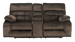 A large scale means large comfort with the Brassville reclining loveseat. Seats are upholstered in a textural, cottony soft fabric. Recline as far back as you please on pillowy arms and headrests. Bustle back tufting adds the right amount of casually cool style. With a storage console and two convenient cup holders, you’ll want to stay here forever.Dual-sided recliner | Pull tab reclining motion | Lift-top storage console and 2 cup holders | Corner-blocked frame with metal reinforced seats | Attached back and seat cushions | High-resiliency foam cushions wrapped in thick poly fiber | Polyester upholstery | Excluded from promotional discounts and coupons
