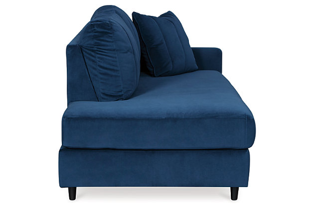 A brilliant take on urban chic styling, the Enderlin corner chaise in vibrant blue makes high design highly affordable. Distinctive elements include quilted channel stitching for clean-lined allure and a velvety soft fabric you'll love living with. Sculptural track arms up the wow factor.Corner-blocked frame | Loose seat cushion | High-resiliency foam cushions wrapped in thick poly fiber | Quilted details | Toss pillow included | Pillow with soft polyfill | Velvet polyester upholstery and pillow | Exposed feet with faux wood finish | Platform foundation system resists sagging 3x better than spring system after 20,000 testing cycles by providing more even support | Smooth platform foundation maintains tight, wrinkle-free look without dips or sags that can occur over time with sinuous spring foundations