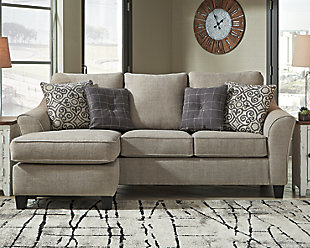 Dressed to impress and put to the test. If you love the idea of beauty with substance, rest your eyes on the Kestrel sofa chaise. Designed for looks and longevity, this decidedly modern sofa chaise with clean lines and flared arms includes our exclusive platform foundation system made to resist sagging and maintain a tight, wrinkle-free aesthetic. Wrapped in an easy-breezy driftwood-tone upholstery, it’s what's new in neutrals.Corner-blocked frame | Attached back and loose seat cushions | High-resiliency foam cushions wrapped in thick poly fiber | 4 decorative pillows included | Pillows with soft polyfill | Polyester upholstery | Polyester; polyester/acrylic/linen; polyester/acrylic pillows | Platform foundation system resists sagging 3x better than spring system after 20,000 testing cycles by providing more even support | Smooth platform foundation maintains tight, wrinkle-free look without dips or sags that can occur over time with sinuous spring foundations | Exposed feet with faux wood finish