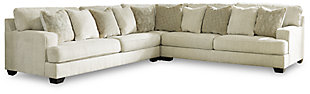 If you love the idea of contemporary style that’s ultra warm and inviting, the Rawcliffe 3-piece sectional with oversized ottoman is casual refinement you’ll love living with. Lightening things up in a fresh neutral tone, this sectional and ottoman set is covered in a decadently soft chenille microfiber that’s love at first touch. Sporting clean lines and wide track arms, the sectional indulges with ultra-deep 45" seats and reversible cushions that are easy to flip and fluff. Firmly cushioned square ottoman multitasks as a footrest and casually cool coffee table.Includes 3-piece sectional (with left-arm facing sofa, right-arm facing sofa and wedge) and oversized ottoman | Left-arm and "right-arm" describe the position of the arm when you face the piece | Corner-blocked frame | Loose, reversible cushions | Firmly cushioned ottoman | High-resiliency foam cushions wrapped in thick poly fiber | 10 accent pillows included | Pillows with soft polyfill | Polyester upholstery and pillows | Exposed feet with faux wood finish | Sectional's smooth platform foundation maintains tight, wrinkle-free look without dips or sags that can occur over time with sinuous spring foundations | Platform foundation system resists sagging 3x better than spring system after 20,000 testing cycles by providing more even support | Estimated Assembly Time: 10 Minutes