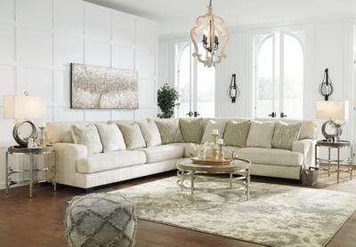 If you love the idea of contemporary style that’s ultra warm and inviting, the Rawcliffe sectional is casual refinement you’ll love living with. Lightening things up in a fresh neutral tone, this sectional is covered in a decadently soft microfiber that’s love at first touch. Rest assured, ultra-deep 45" seats and reversible cushions you can flip and fluff nicely accommodate, while clean-lined styling and wide track arms make a fashion statement.Includes 3 pieces: left-arm facing sofa, right-arm facing sofa and wedge | "Left-arm" and "right-arm" describe the position of the arm when you face the piece | Corner-blocked frame | Loose, reversible cushions | High-resiliency foam cushions wrapped in thick poly fiber | 10 accent pillows included | Pillows with soft polyfill | Polyester upholstery and pillows | Exposed feet with faux wood finish | Platform foundation system resists sagging 3x better than spring system after 20,000 testing cycles by providing more even support | Smooth platform foundation maintains tight, wrinkle-free look without dips or sags that can occur over time with sinuous spring foundations | Estimated Assembly Time: 10 Minutes