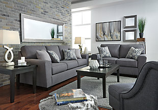 In the chicest shade of gray, Calion sofa’s linen-weave upholstery complements so many color schemes and aesthetics. Flared arms, prominent welting and flamestitch-print pillows add just enough panache to this sweet and simple sofa. Supportive seat cushions make for one comfortable landing pad.Corner-blocked frame | Attached back and loose seat cushions | High-resiliency foam cushions wrapped in thick poly fiber | 4 decorative pillows included | Polyester upholstery and pillows with soft polyfill | Exposed feet with faux wood finish | Excluded from promotional discounts and coupons