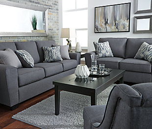 In the chicest shade of gray, Calion loveseat’s linen-weave upholstery complements so many color schemes and aesthetics. Flared arms, prominent welting and flamestitch-print pillows add just enough panache to this sweet and simple loveseat. Supportive seat cushions make for one comfortable landing pad.Corner-blocked frame | Attached back and loose seat cushions | High-resiliency foam cushions wrapped in thick poly fiber | 2 decorative pillows included | Polyester upholstery and pillows with soft polyfill | Exposed feet with faux wood finish | Excluded from promotional discounts and coupons
