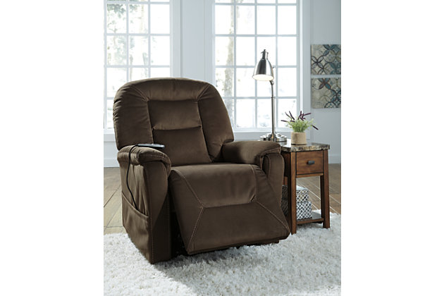 How beautifully the Samir power lift recliner elevates your level of comfort. On those days when you need a little pampering, you’re sure to love the heat-and-massage element incorporated within the back cushion. Sporting a sleek design, with a unique crescent back and double-stitched tailoring, this power lift recliner has the corner on contemporary style.One-touch (hand control) power button with adjustable positions | Corner-blocked frame with metal reinforced seat | Attached cushions | High-resiliency foam cushions wrapped in thick poly fiber | Polyester upholstery | Emergency battery backup runs on two 9-volt batteries (not included), in case of power outage | Back cushion heat-and-massage feature (choice of two massage power levels) | Side pocket storage | Power cord included; UL Listed | Excluded from promotional discounts and coupons | Estimated Assembly Time: 15 Minutes