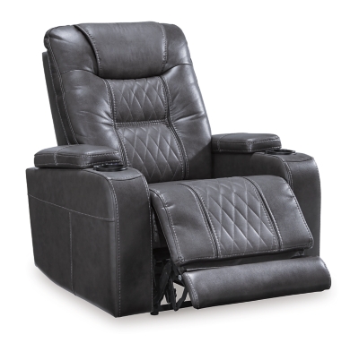 Movie nights will be forever changed with the Composer power recliner. The adjustable Easy View™ headrest allows a primo view of the TV no matter how far back you recline and the extended ottoman provides extra room to really stretch out. Ultra-cool lattice stitching elevates the look and ambient LED lighting completes the theater-style experience. So relax, kick off your shoes and enjoy the show.One-touch power control with adjustable positions | Corner-blocked frame with metal reinforced seat | Attached back and seat cushions | High-resiliency foam cushions wrapped in thick poly fiber | Easy View™ power adjustable headrest | Includes USB charging port in the power control | Extended ottoman for enhanced comfort | Ambient blue LED lighting on cup holders and base for a theater-style experience | Polyester/polyurethane upholstery | Power cord included; UL Listed | Estimated Assembly Time: 15 Minutes