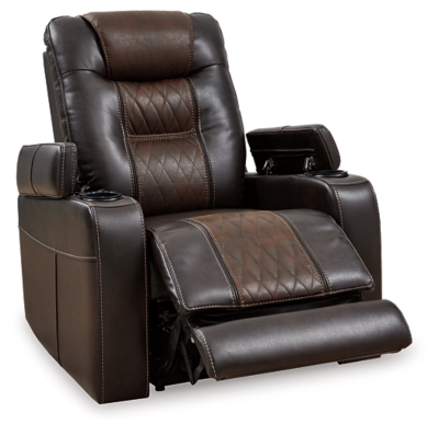 Movie nights will be forever changed with the Composer power recliner. The adjustable Easy View™ headrest allows a primo view of the TV no matter how far back you recline and the extended ottoman provides extra room to really stretch out. Ultra-cool lattice stitching elevates the look and ambient LED lighting completes the theater-style experience. So relax, kick off your shoes and enjoy the show.One-touch power control with adjustable positions | Corner-blocked frame with metal reinforced seat | Attached cushions | High-resiliency foam cushions wrapped in thick poly fiber | Easy View™ power adjustable headrest | Includes USB charging port in the power control | Extended ottoman for enhanced comfort | Ambient blue LED lighting on cup holders and base for a theater-style experience | Polyester/polyurethane upholstery | Power cord included; UL Listed | Estimated Assembly Time: 15 Minutes