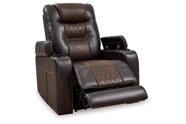 With its designer aesthetic and home movie theater features, the Composer power recliner hits a high note for style and comfort. Thanks to an adjustable Easy View™ headrest, you’ll have a primo view of the TV, no matter how far back you recline. Ultra-cool lattice stitching elevates the look of this modern power recliner. Ambient blue LED lighting on the base and cup holders completes the theater-style experience.One-touch power control with adjustable positions | Corner-blocked frame with metal reinforced seat | Attached cushions | High-resiliency foam cushions wrapped in thick poly fiber | Easy View™ power adjustable headrest | Includes USB charging port in the power control | Extended ottoman for enhanced comfort | Ambient blue LED lighting on the base and cup holders for a theater-style experience | Polyester/polyurethane upholstery | Power cord included; UL Listed | Estimated Assembly Time: 15 Minutes