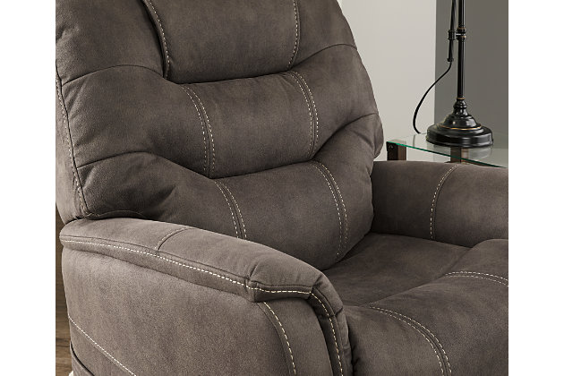 Take charge of your seating with the Ballister power lift recliner. Its easy power button motion control allows you the full spectrum of comfort—from a gentle lift-and-tilt for standing up to a lay flat design ideal for an afternoon snooze. Not much gets past the power adjustable headrest and lumbar support, or even the independent motor controls to get that just right position. You’ll always stay connected with the included USB charging port in the power control, and relish in the hours of versatile support that never stops giving.One-touch (hand control) power button with adjustable positions | Easy View™ power adjustable headrest and power lumbar support | Corner-blocked frame with metal reinforced seat | Attached back and seat cushions | High-resiliency foam cushions wrapped in thick poly fiber | Side pocket storage | Includes USB charging port in the power control | 4-motor design allows for independent control of leg rest, backrest, lumbar support and headrest for perfectly positioned comfort | Lay flat design for extended naptime comfort | Polyester upholstery | Compatible with emergency battery backup (sold separately), in case of power outage | Power cord included; UL Listed | Estimated Assembly Time: 15 Minutes